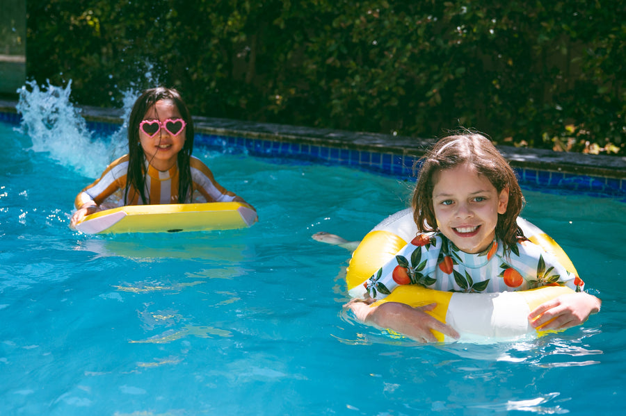 Kids in AVALY wetsuits ready for the beach - the ultimate guide to kids wetsuits