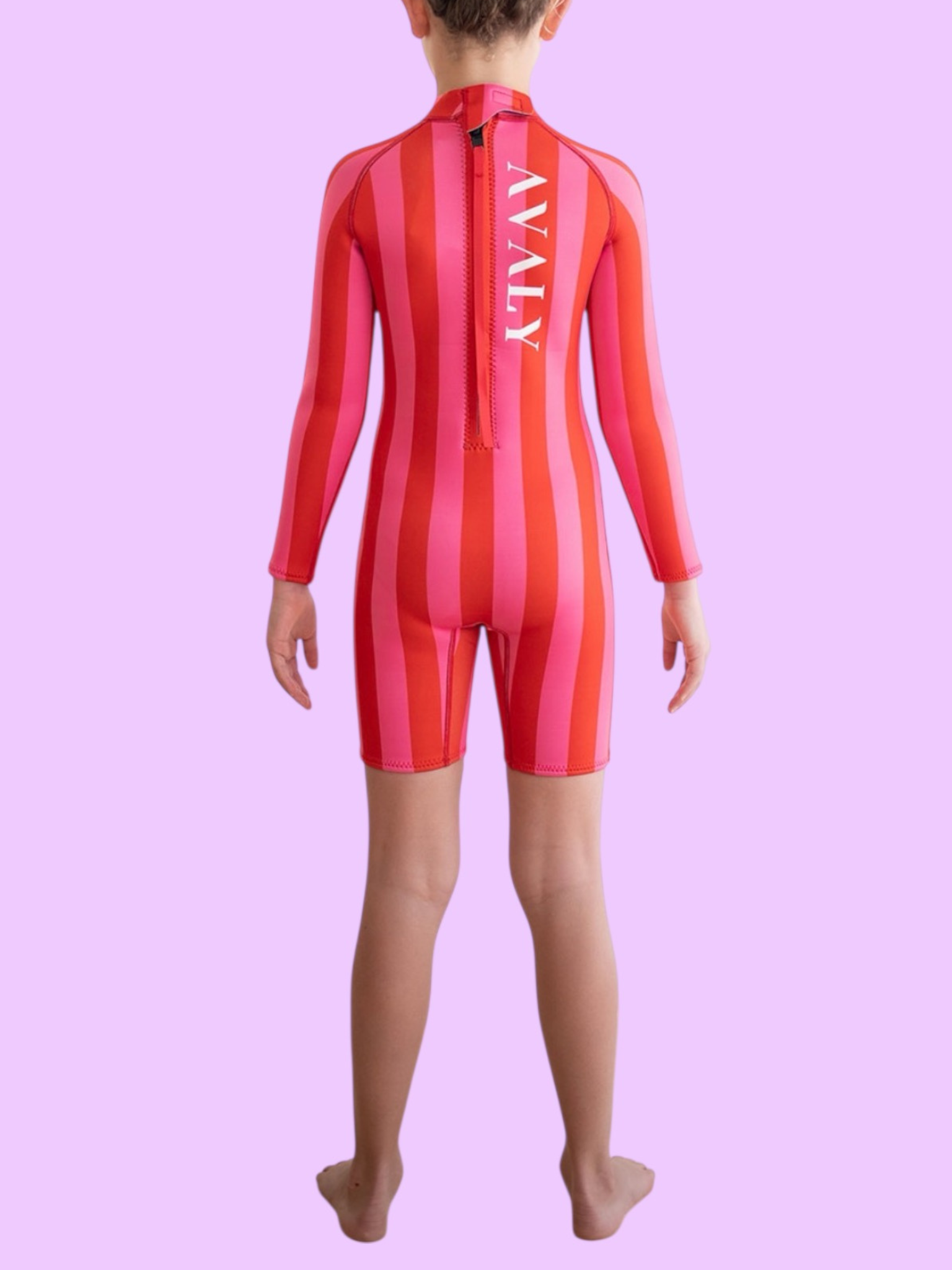 Back view of child wearing Pink & Red Stripe Kids Wetsuit showing vertical stripes and rear zipper