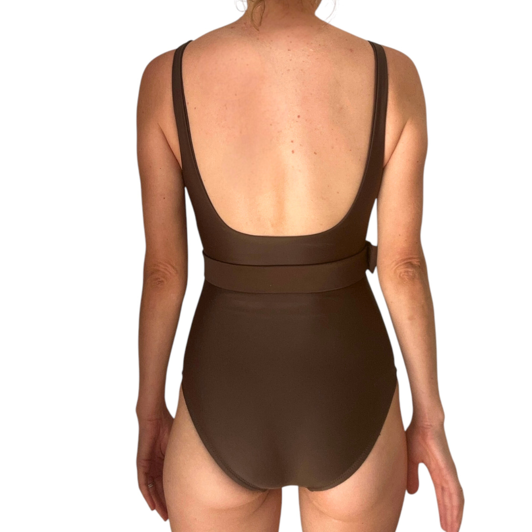 Back view of woman wearing Chocolate One Piece swimsuit showing open back design with shoulder straps