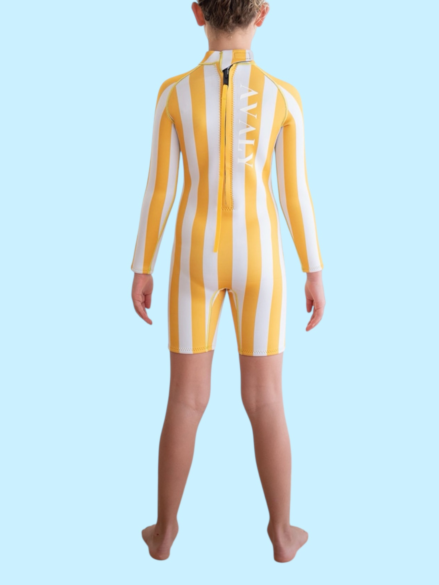 Back view of child wearing Yellow Stripe Kids Wetsuit showing vertical stripes and rear zipper closure