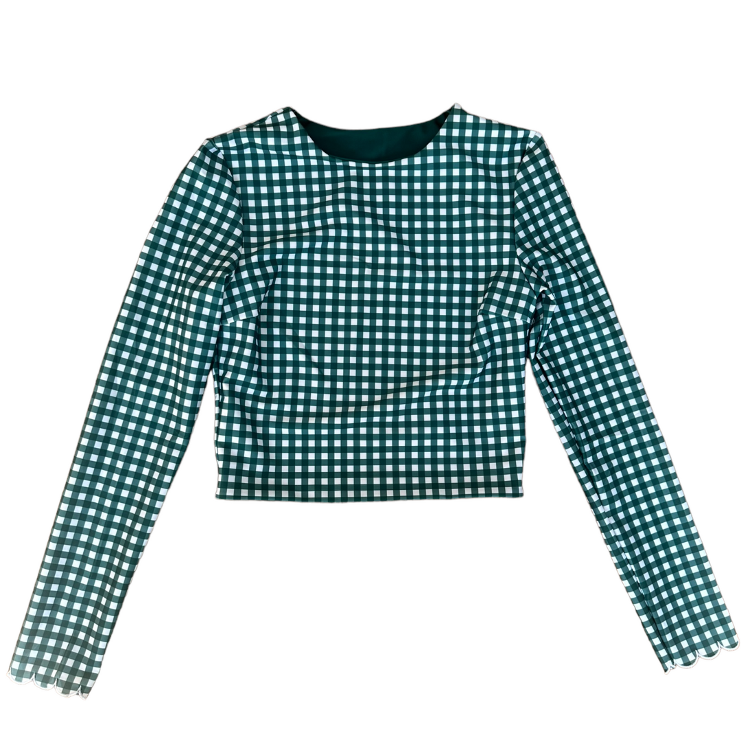 Flat lay of Green Gingham Midi Rash Top showing checkered pattern and cropped length with long sleeves