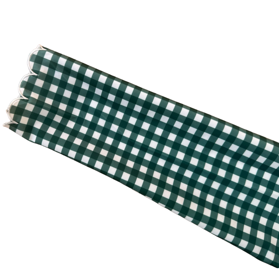Flat lay of Green Gingham Midi Rash Top showing classic checkered pattern in forest green and white