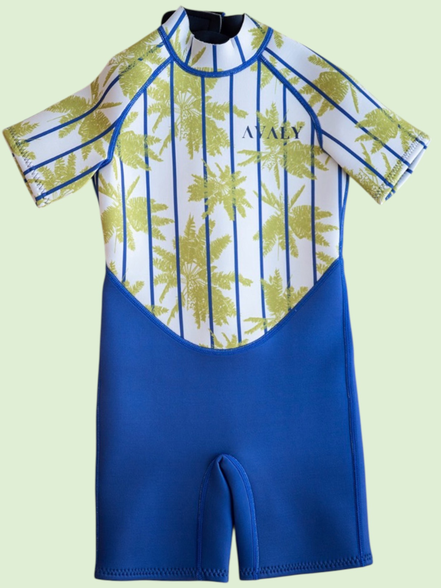 Flat lay of Blue Palm Kids Wetsuit showing white tropical palm print top with blue vertical stripes and solid blue shorts