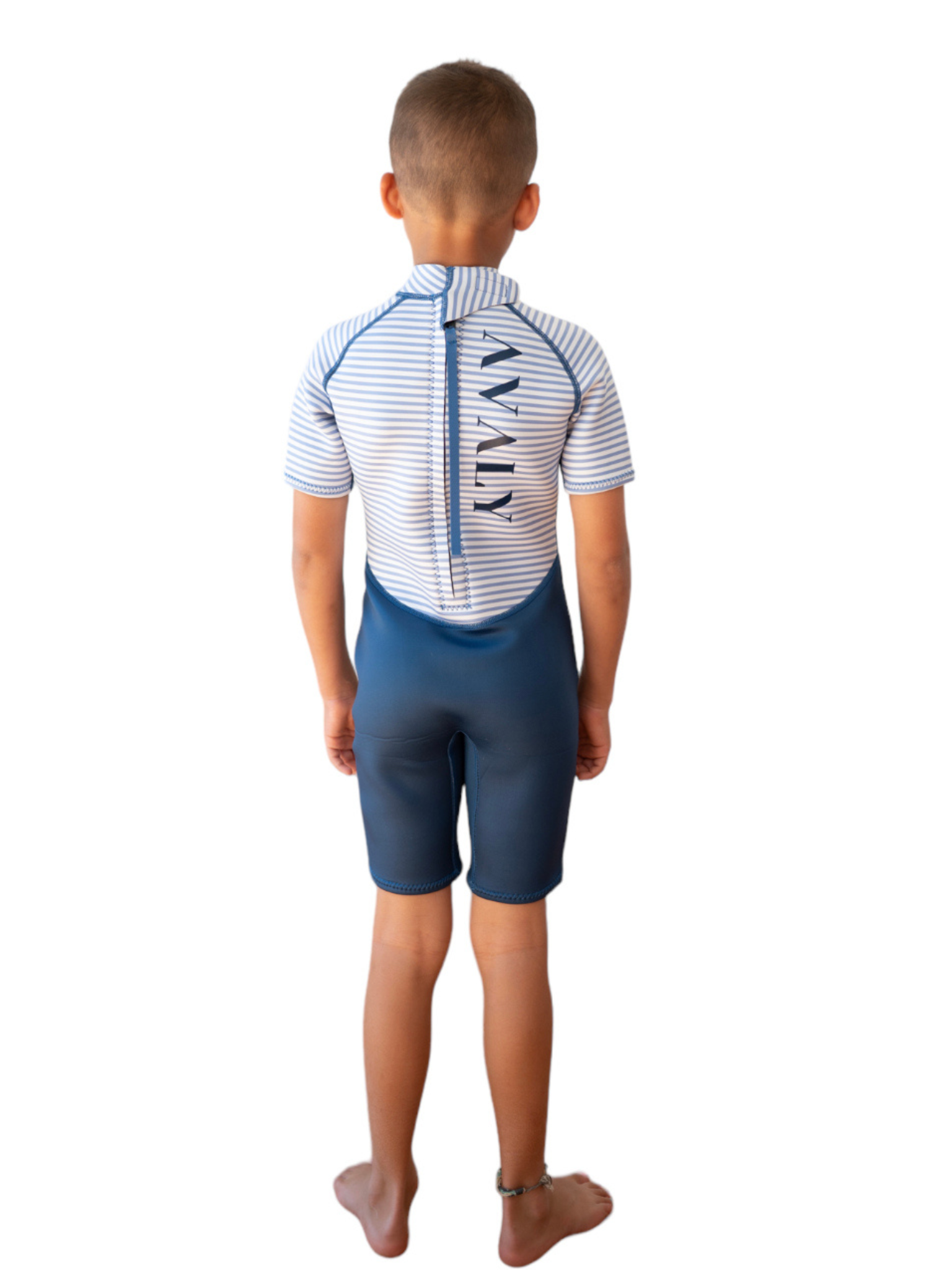 Back view of child wearing Navy Stripe Kids Wetsuit showing blue and white striped top with full zip closure
