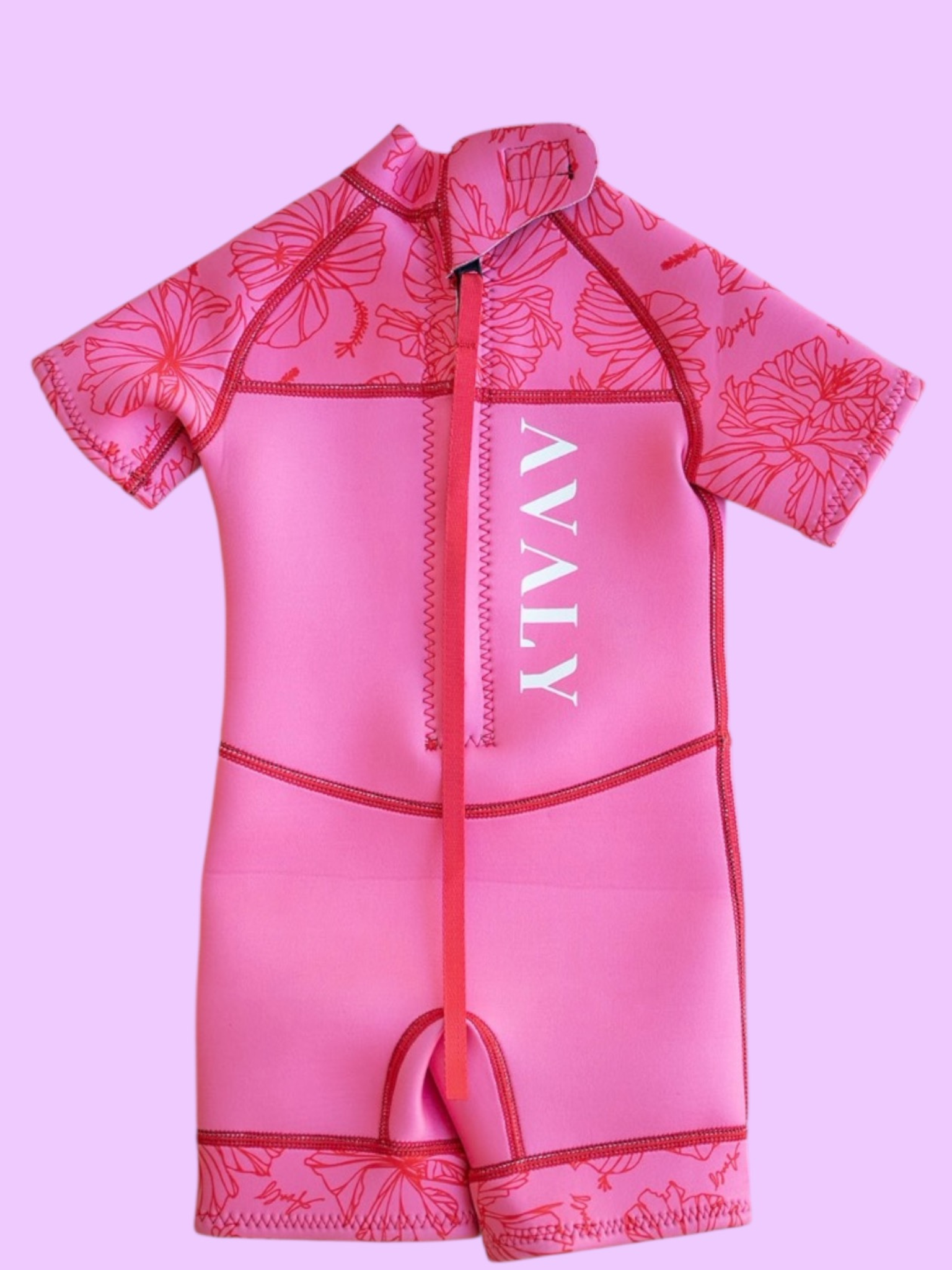 Flat lay of Pink Hibiscus Kids Wetsuit showing full zip front, hibiscus floral sleeves, and solid pink body with white Avaly logo